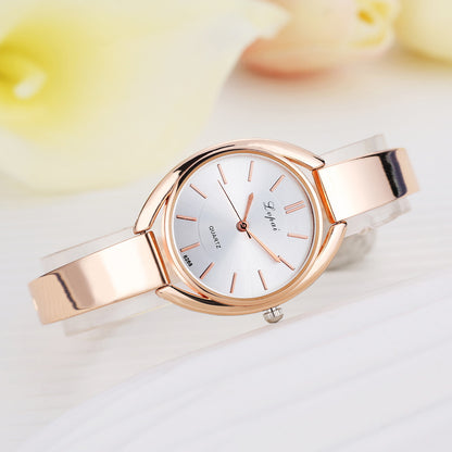 Fashionable alloy quartz watch with drill
