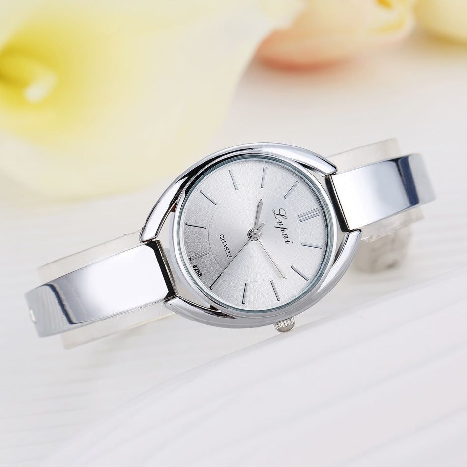 Fashionable alloy quartz watch with drill